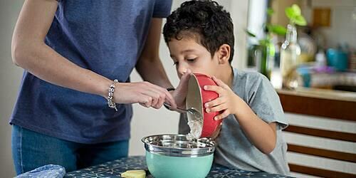 Mother and child baking as a new hobby