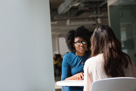 Two women in conversation