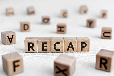 RECAP - words from wooden blocks with letters stock photo