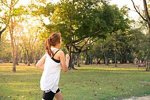 Woman running in the outdoors.