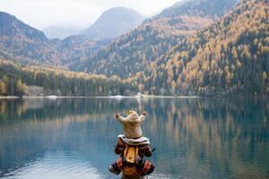 Child and Adult by a Lake