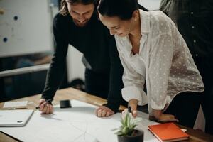 Two people working together on a project.