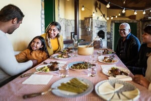 Family enjoying a Spanish meal time